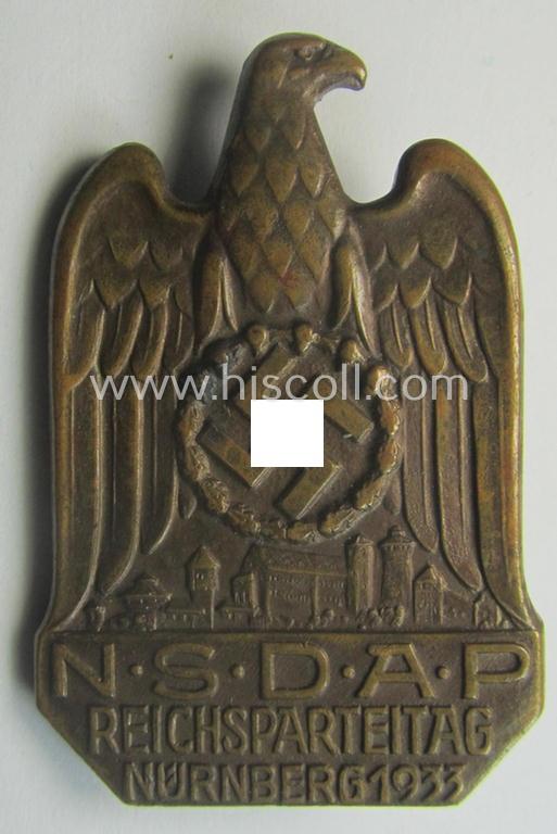 Repaired, N.S.D.A.P.-related 'tinnie' (ie. 'Tagungs- o. Veranstaltungsabzeichen'-) being a non-maker-marked, 'solid-back'-pattern and/or golden-bronze-toned example showing the text: 'N.S.D.A.P. Reichsparteitag - Nürnberg 1933'