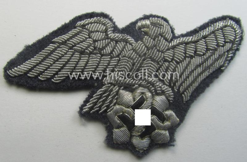 Stunning - and very scarcely encountered! - officers'-pattern, 'Luftschutz' (ie. RLB-) breasteagle being a neatly hand-embroidered- and luxuriously-styled example that is executed onto a bluish-grey-coloured- and/or woolen-based background