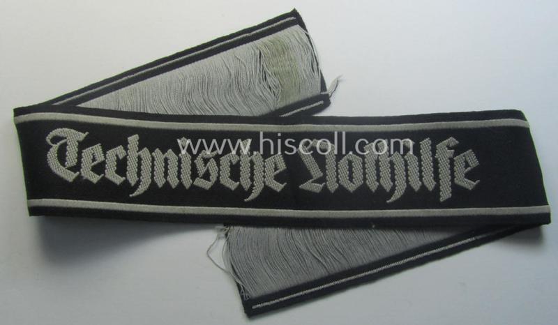 Minimally used and/or carefully tunic-removed, TeNo-cuff-title (ie. 'Ärmelstreifen') entitled: 'Technische Nothilfe' (= 'TeNo') being a full length example as was woven in the neat 'BeVo'-weave pattern