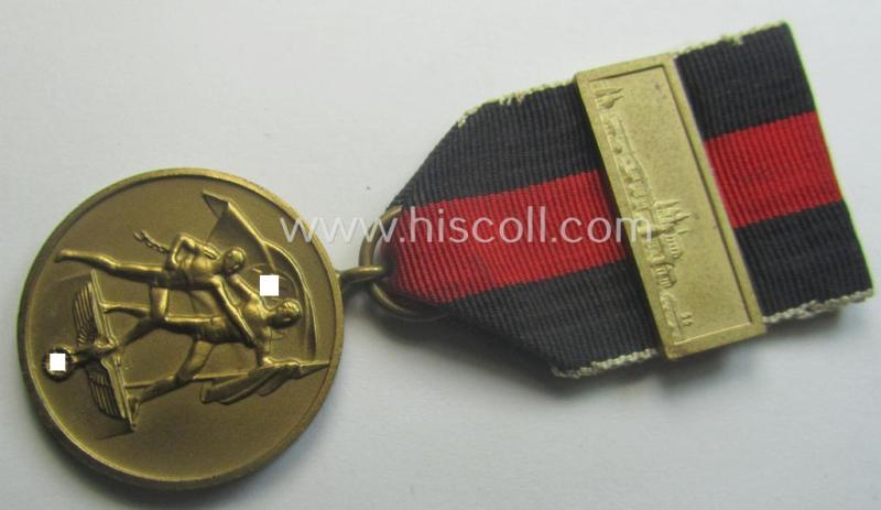 WH Czech-occupation- (ie. 'Anschluss'-) medal: '1. Oktober 1938' being a neat (albeit minimally tarnished) example that comes mounted onto its period ribbon and that shows a firmly (and period!) attached 'Prager Burg-Spange'