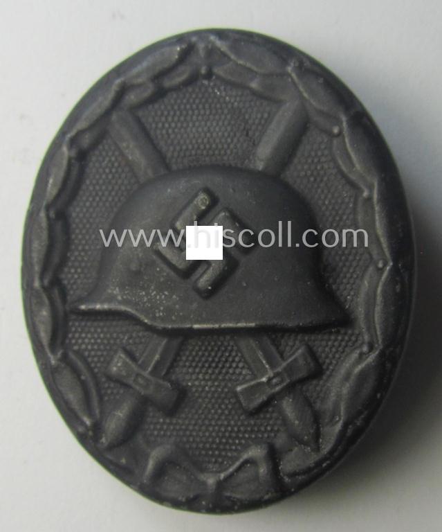 Black-class wound-badge (or: 'Verwundeten-Abzeichen in Schwarz') being a maker- (ie. '4'-) marked specimen as was produced by the maker (ie. 'Hersteller') named: 'Steinhauer & Lück'