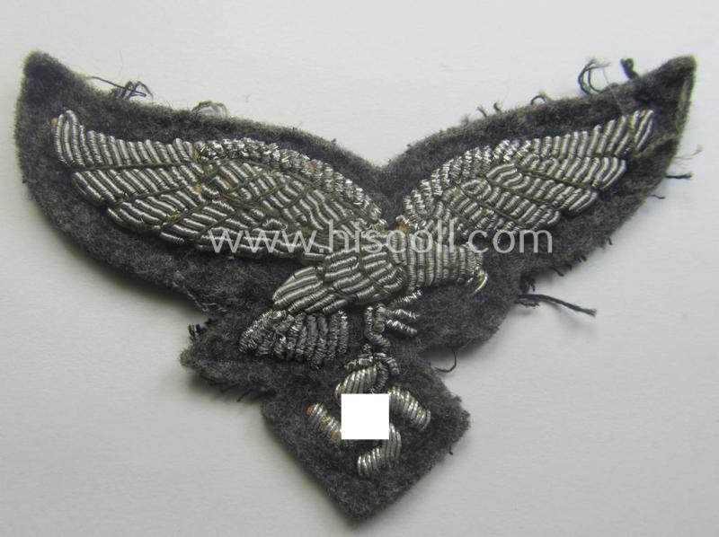 WH (Luftwaffe) officers'-pattern visor-cap-eagle (ie. 'Adler für LW-Offiziers-Schirmmütze') being a neatly hand-embroidered example of the: 'Extra Qualität' that comes in a moderately used- (ie. carefully cap-removed-), condition