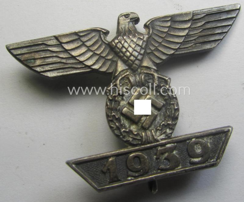 Moderately used- ie. worn, 'Wiederholungsspange zum EK I. Klasse' (or: bar to the WWI IC first-class) as was produced by the (desirable!) maker (ie. 'Hersteller'): 'Eugen Schmidthaussler'