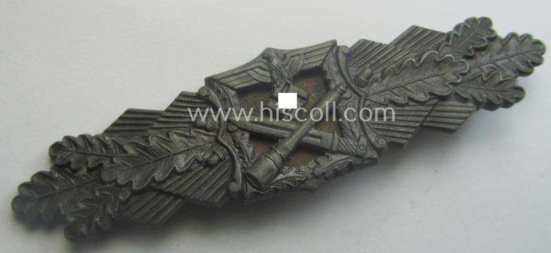 'Nahkampfspange in Bronze' (or: bronze-class close-combat clasp ie. CCC) being a neatly maker-marked- and/or minimally converse-shaped specimen as was produced by the: 'JFS'- (ie. 'Joseph Feix u. Söhne'-) company