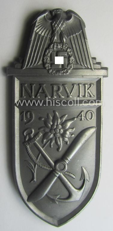'Virtually mint' - albeit regrettably incomplete - example of a WH (Heeres etc.) 'Narvik'-campaign-shield as executed in typical: 'Feinzink' (as was presumably produced by the: 'Wilhelm Deumer'-company)