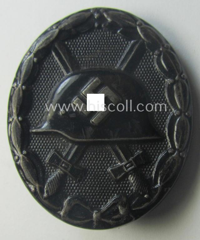 Maker- (ie. '113'-) marked example of a black-class wound-badge (or: 'Verwundeten-Abzeichen in Schwarz') being a scarcely found example that was produced by the maker (ie. 'Hersteller') named: 'Hermann Aurich'