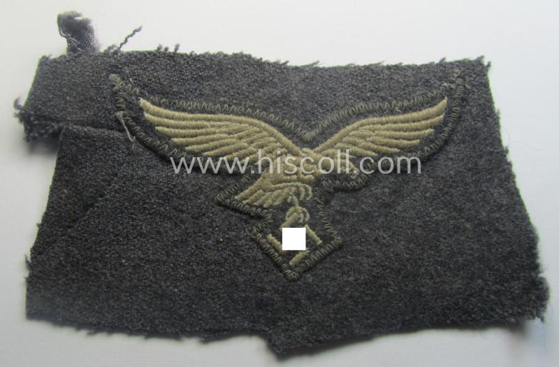 'Cut-out of a tunic' - WH (Luftwaffe) EM- (ie. NCO-) type breasteagle (ie. 'Brustadler für Mannschaften und Unteroffiziere der Luftwaffe')