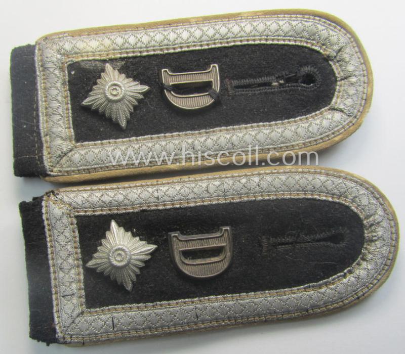 Superb pair of Waffen-SS NCO-type, 'cyphered' shoulderstraps as piped in the white-coloured branchcolour as was intended for usage by an: 'SS-Oberscharführer' who served within the: SS-Rgt. 'Deutschland' (2. SS-Pz-Div. 