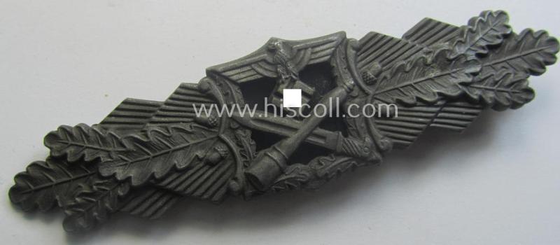 'Nahkampfspange in Bronze' (or: bronze-class close-combat clasp ie. CCC) being a neatly maker-marked- and/or minimally converse-shaped specimen as was produced by the: 'JFS'- (ie. 'Joseph Feix u. Söhne'-) company