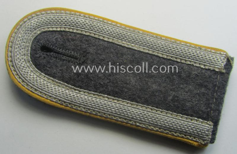 Single, mid- (ie. later-) war-period WH (Heeres) NCO-type shoulderstrap as piped in the golden-yellow- (ie. 'goldgelbener'-) coloured branchcolour as was intended for usage by an: 'Uffz. der Flieger o. Fallschirm-Trpn.'