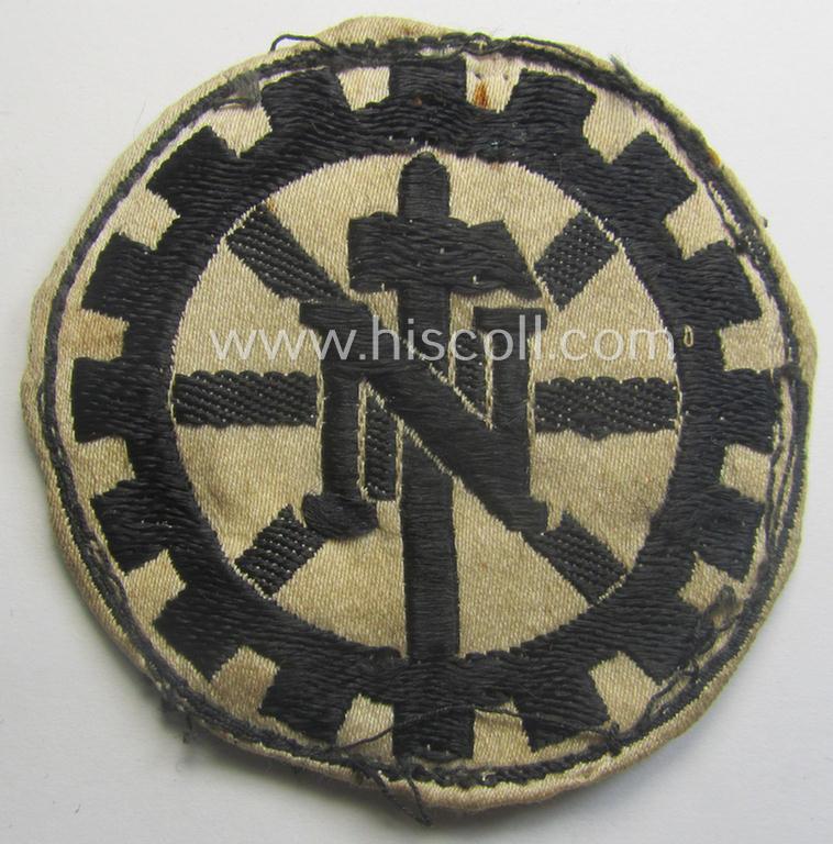Truly used - and most certainly scarcely found! - Dutch-related, TeNo- (ie. 'Technische Nothilfe'-) related armband-patch (ie. 'Abz. für den TeNo-Armbinde') being of the 'BeVo-woven'-type showing the typical 'TeNo'-symbol