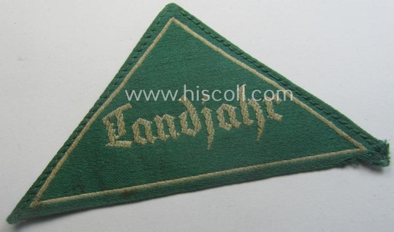 HJ (ie. 'Hitlerjugend') honorary-district-triangle (ie. 'Gebietsdreieck') entitled: 'Landjahr' being an example that still retains its 'RzM'-etiket and that comes in an overall very nice (albeit just moderately used ie. worn condition)