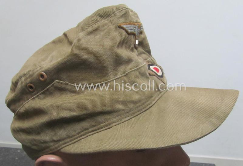 WH (Heeres), 'M41-pattern', tropical-issued field-cap (ie.: 'Tropen-Einheitsfeldmütze') being an (approx.) 57-cms.-sized example that is neatly maker- (ie. 'RbN. nr.'-) marked and that comes in a moderately worn- ie. used, condition