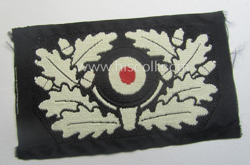 Attractive - and actually not that easily encountered! - early-pattern, WH (Heeres) specific cocarde as executed in white-coloured linnen in the so-called: 'BeVo'-weave as was intended for usage on the: 'Pz'-beret (ie. 'Panzerschutzmütze')