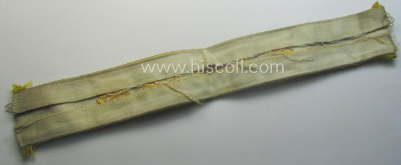 Truly worn WH cuff-title (ie. 'Ärmelstreifen') entitled: 'Kreta' (being a period-shortened example that comes in a clearly issued-, worn- and/or most certainly once tunic-attached, condition)