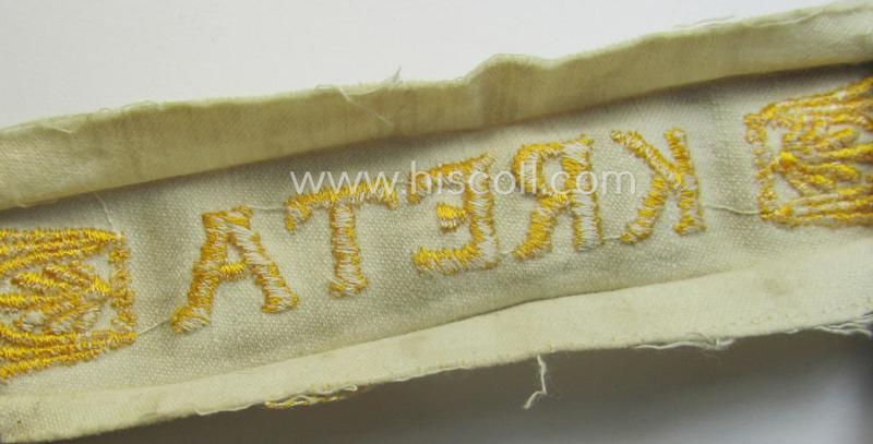 Truly worn WH cuff-title (ie. 'Ärmelstreifen') entitled: 'Kreta' (being a period-shortened example that comes in a clearly issued-, worn- and/or most certainly once tunic-attached, condition)