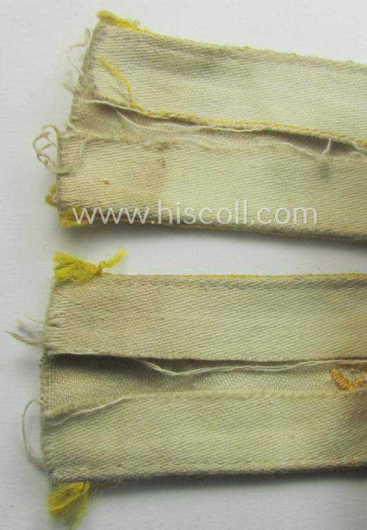 Truly worn WH cuff-title (ie. 'Ärmelstreifen') entitled: 'Kreta' (being a period-shortened example that comes in a clearly issued-, worn- and/or most certainly once tunic-attached, condition)