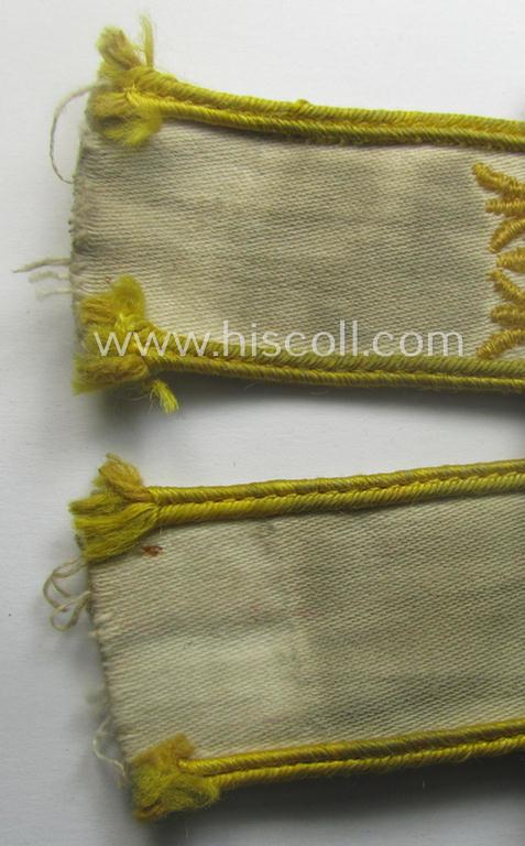 Truly worn WH cuff-title (ie. 'Ärmelstreifen') entitled: 'Kreta' (being a period-shortened example that comes in a clearly issued-, worn- and/or most certainly once tunic-attached, condition)