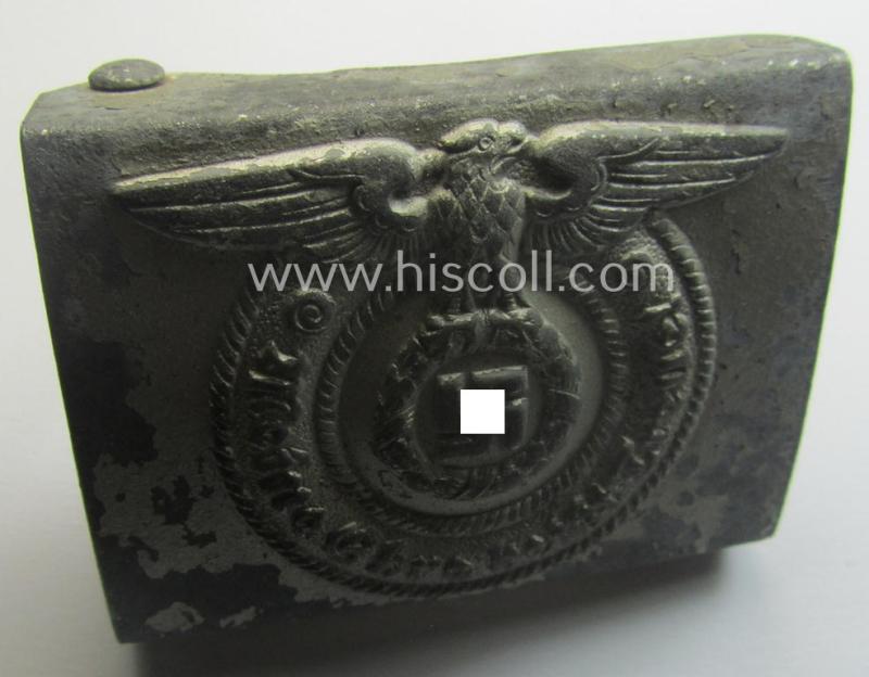 Waffen-SS, EM- (ie. NCO-) type belt-buckle (being a typical, unmarked and typical steel-based: 'Overhoff & Cie'-example) that comes in a surely issued- and/or moderately used- ie. worn, condition