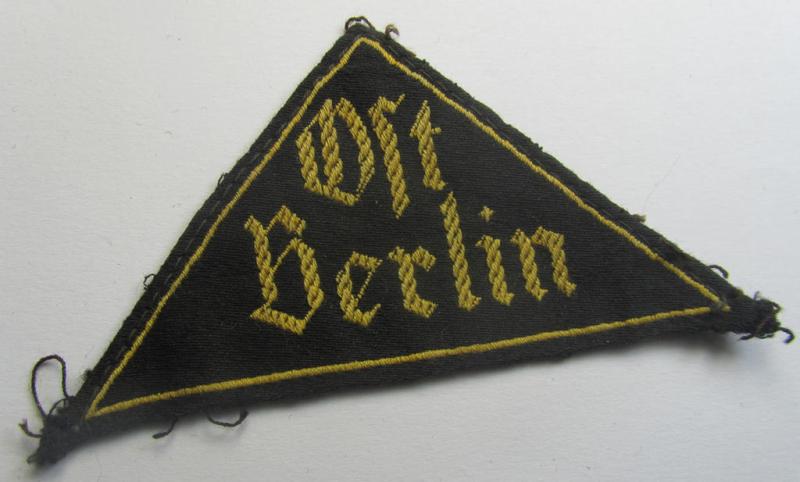 Scarcely found, 'HJ' ('Hitlerjugend') district-triangle (ie. 'Gebietsdreieck') entitled: 'Ost Berlin' (being a clearly used example that is void of an 'RzM'-etiket)