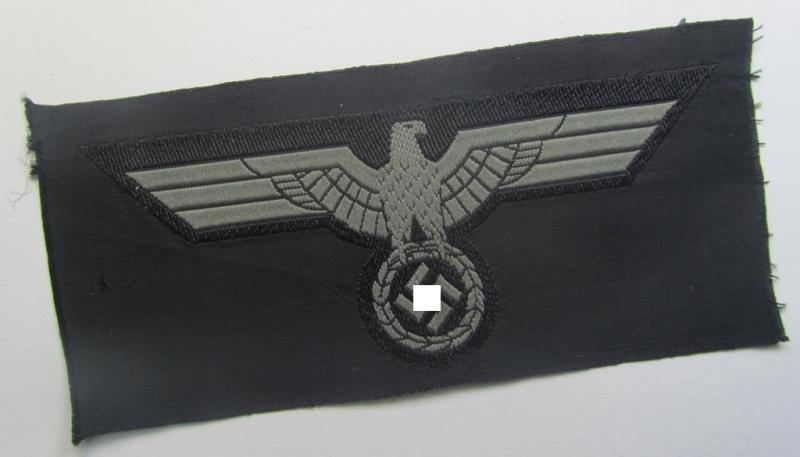 Later- (ie. mid-war-) period, WH (Heeres) 'Panzer'-type breast-eagle (ie. 'Brustadler für Panzertruppen') being a 'virtually mint- ie. unissued' example as executed in bluish-grey-coloured linnen on a black-coloured background