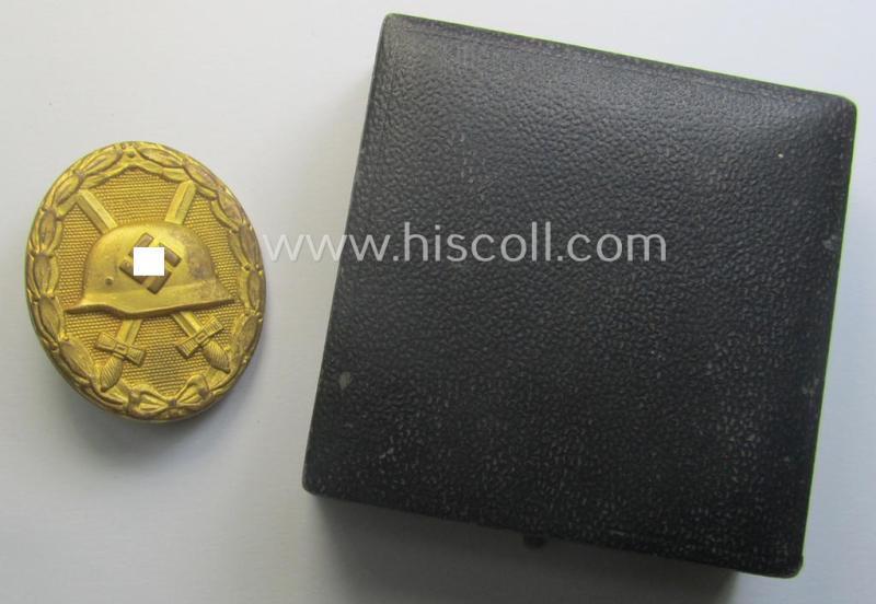 'Verwundeten-Abzeichen in Gold' being a non-maker-marked- and typical 'Buntmetall'-based (ie. 'thin-pinned'!) example that comes stored in its maker- (ie. 'Hauptmünzamt - Wien'-) marked etui as issued