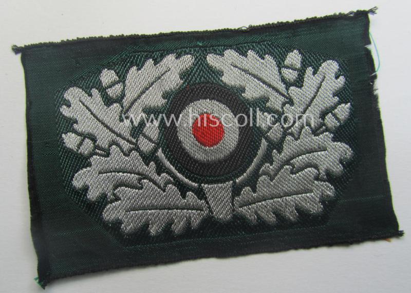 WH (Heeres) officers'-type cocarde (as executed in so-called: 'flat-wire'- ie. 'BeVo'-weave pattern) as was specifically intended for usage on the: 'Knautschmützen o. Alter-Art-Schirmmützen' ie. visor-caps