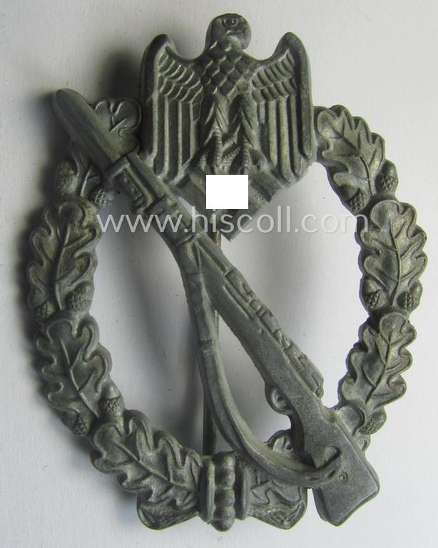 Attractive - and mininally used! - 'Infanterie-Sturmabzeichen in Silber' (or: silver-class infantry-assault badge ie. IAB) being a neatly maker- (ie. '4'- or: 'Metall u. Kunststoff'-) marked example as executed in silverish-coloured 'Feinzink'