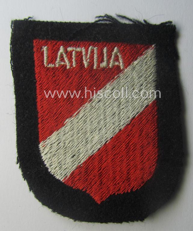 Waffen-SS 'volunteer'-arm-shield as was intended for usage by soldiers of the: '15. o. 19. Waffen-Grenadier-Division der SS' (ie. 'lettische nr. 1 o. 2') and that comes in a 'virtually mint- ie. unissued', condition
