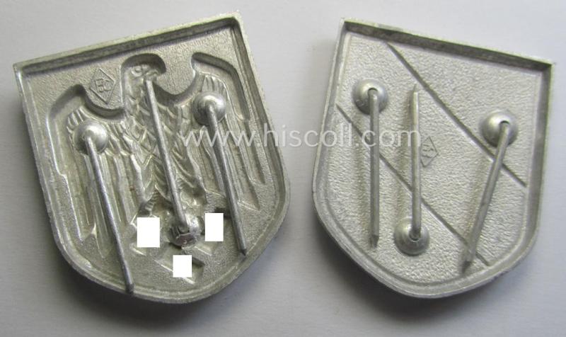 'Virtually mint ie. unissued' pair of WH (Heeres) tropical- (ie. 'DAK'- or: 'Deutsches Afrikakorps'-) related- and/or aluminium-based, eagle-'pith-helmet'-shields comprising of two maker- (ie. 'P&C'-) marked examples