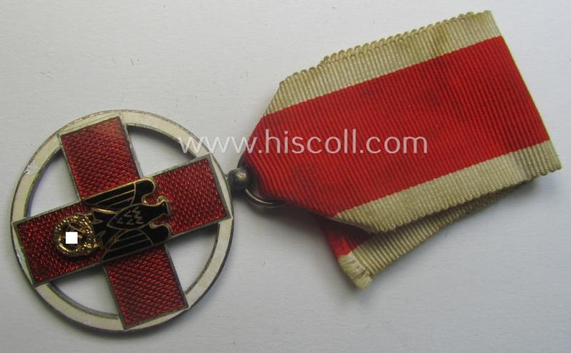 'DRK-Ehrenzeichen des 3. Modell' that comes together with its original (regular-sized- and period-mounted) ribbon (ie. 'Bandabschnitt') as issued and/or stored for decades