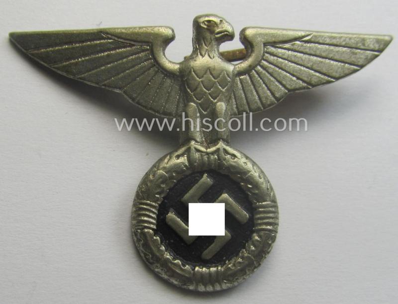 Silver-toned - and I deem 'Buntmetall'-based - early-pattern, SS- o. SA-type, political- ie. 'Art Deco'-styled visor- (ie. 'Schirmmützen'-) cap-eagle being a maker-marked (ie. 'RzM 2?'-) marked example