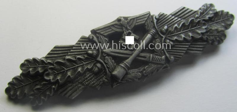 'Nahkampfspange in Bronze' (or: bronze-class close-combat clasp ie. CCC) being a maker- (ie. 'FLL'-) marked- and minimally converse-shaped so-called: '3rd pattern'-specimen as was produced by the maker- (ie. 'Hersteller') 'Friedrich Linden'