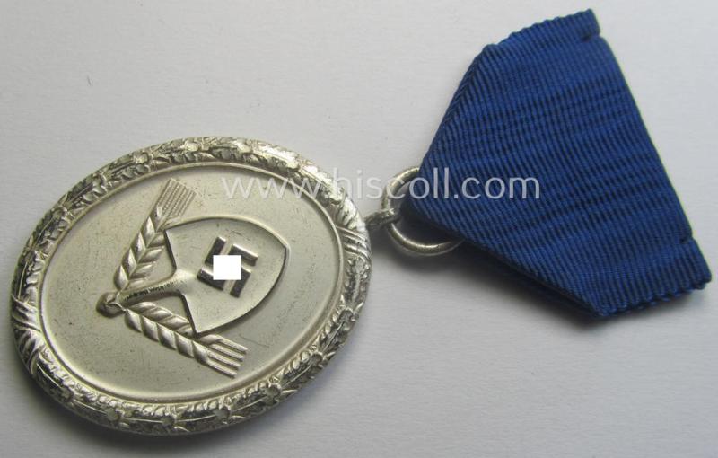 RAD (ie. 'Reichsarbeitsdienst') so-called: 'Dienstauszeichnung 3. Stufe für Männer' (as was intended for 12 years loyal-service) and that came mounted onto its period (albeit shortened) piece of ribbon (ie. 'Bandabschnitt')