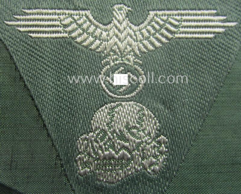 Superb - and simply never used nor cap-attached - Waffen-SS field-grey-coloured, M43-pattern cap-trapezoid as was intended for usage on the M43-model field-caps (ie. 'Einheitsfeldmützen') that comes in a 'virtually mint- ie. unissued', condition