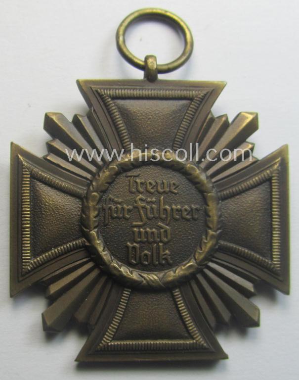 'N.S.D.A.P. Dienstauszeichnung in Bronze' (ie. '3. Stufe für 10 Jahre t. Dienste') being a maker- (ie. '53'-) marked- (and 'regular-weight' ie. 'Buntmetall'-based!) example that comes together with its period ribbon (ie. 'Bandabschnitt')