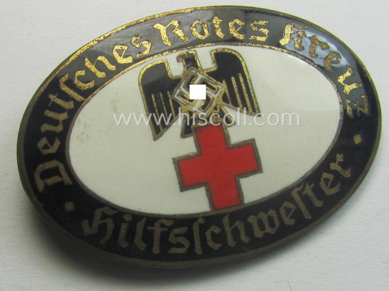 Superb - and rarely seen! - DRK (ie. 'Deutsches Rotes Kreuz') so-called: nurses'-badge entitled: 'Hilfsschwester' being an oval-shaped- and/or maker-marked specimen showing an engraved bearers'-number: ('96') and towns'-name: 'Karlsruhe'