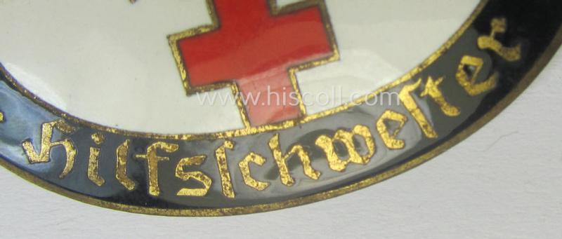 Superb - and rarely seen! - DRK (ie. 'Deutsches Rotes Kreuz') so-called: nurses'-badge entitled: 'Hilfsschwester' being an oval-shaped- and/or maker-marked specimen showing an engraved bearers'-number: ('96') and towns'-name: 'Karlsruhe'