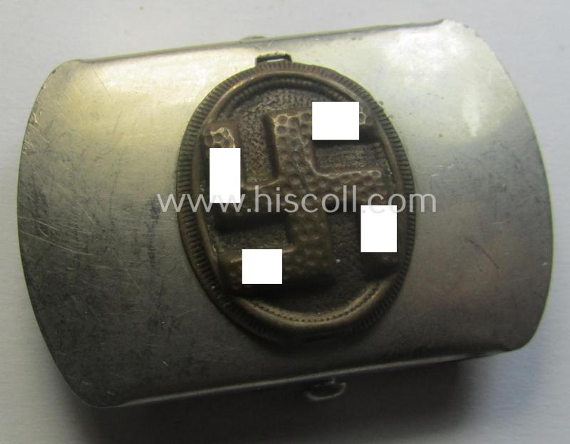 Bright-silver-toned (ie. chromed metal-based) patriotic belt-buckle (ie. N.S.D.A.P.-supportive-piece) that shows a bronze-toned swastika surrounded by a pronounced rim