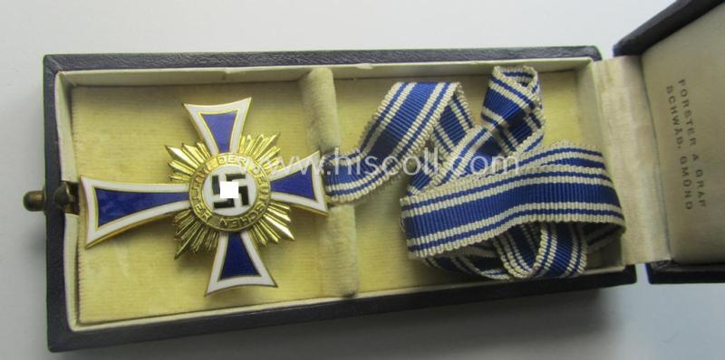 'Ehrenkreuz der deutschen Mutter - erste Stufe' (or mothers'-cross in gold) that comes stored in its original and/or neatly maker- (ie. 'Forster & Graf - Schwäb. Gmünd'-) marked etui as issued and/or recently found