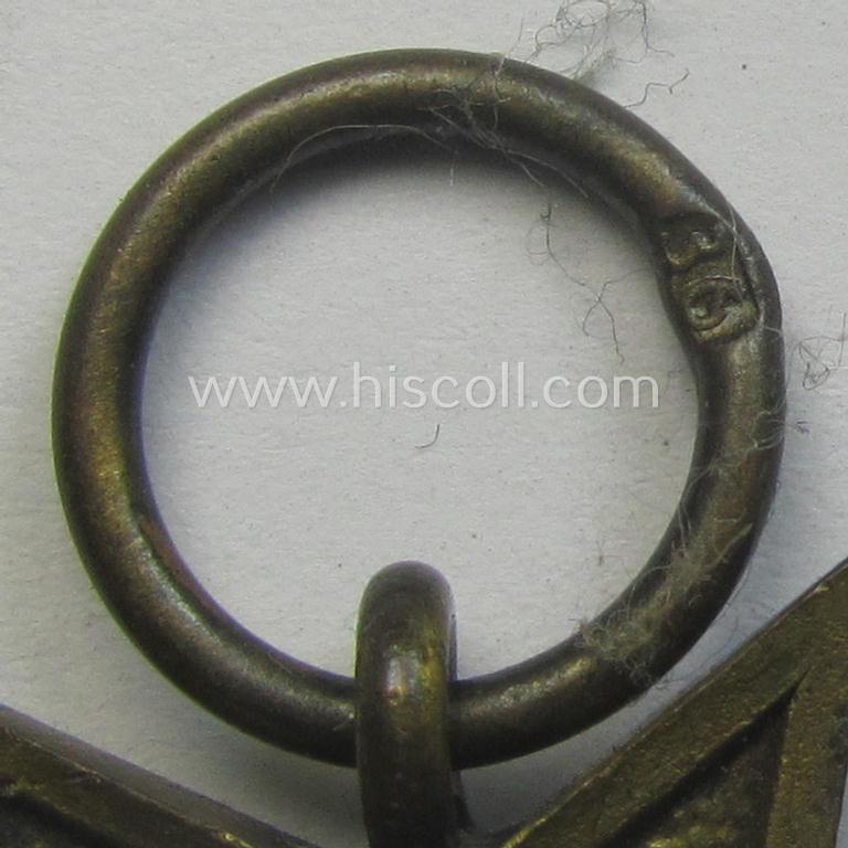 Fully matching medal-set: 'KvK 2. Klasse o. Schwn.' being a clearly maker- (ie. '36'-) marked specimen that comes in its (incomplete ie. relic) pouch by the 'Hersteller': 'Burg & Leonhard - Hanau a. M.'