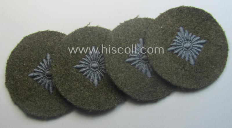 WH (Heeres) 'standard-type'- and early-pattern, tropical-style rank-insignia (ie. roundel), as executed in bluish-grey coloured linnen on a brownish-green background: 'Oberschütze'