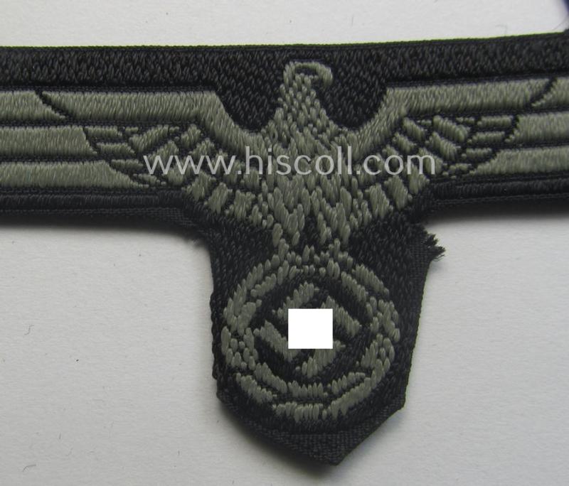 WH (Heeres) later- (ie. mid-war-) period- and/or bluish-grey-coloured 'Panzer'-type side-cap-eagle a executed in the neat 'BeVo'-weave pattern onto a typical black-coloured background