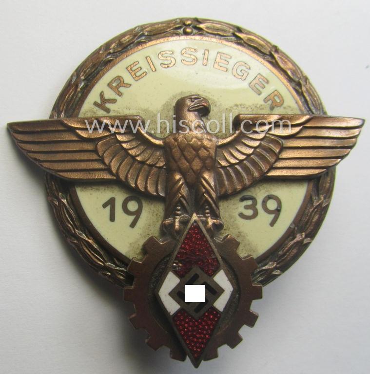 'HJ'- ('Hitlerjugend') ie. 'BDM'- ('Bund Deutscher Mädel') related: 'Reichsberufswettkampf-Siegerabzeichen' (of the 2nd model) entitled: 'Kreissieger 1939' and being a neatly maker- (ie.: 'H. Aurich'-) marked example