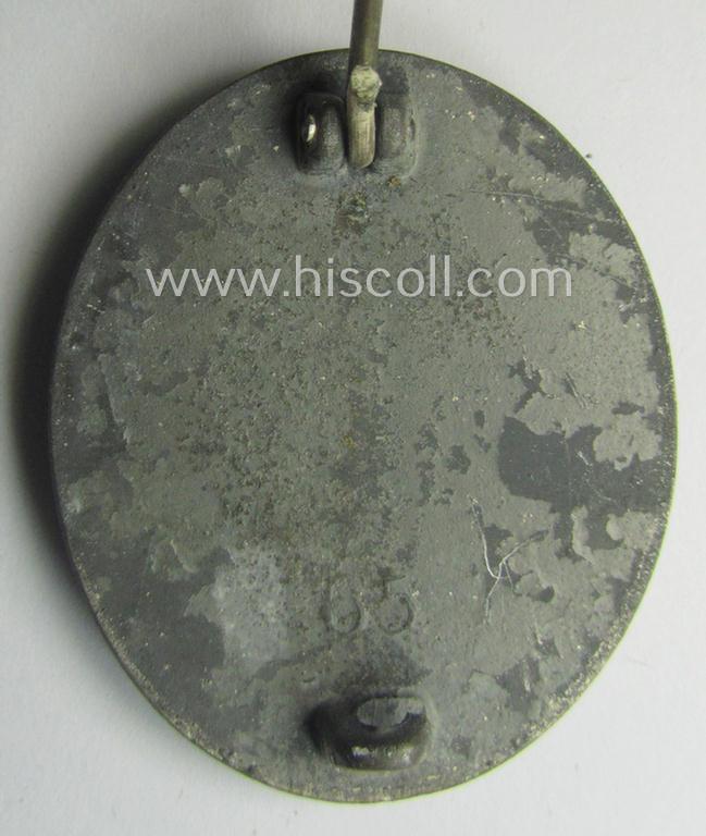 Moderately used- and/or worn 'Verwundeten-Abzeichen in Silber' being a typical maker- (ie. '65'-) marked- and/or: 'Feinzink'-based example by the maker: 'Klein & Quenzer'