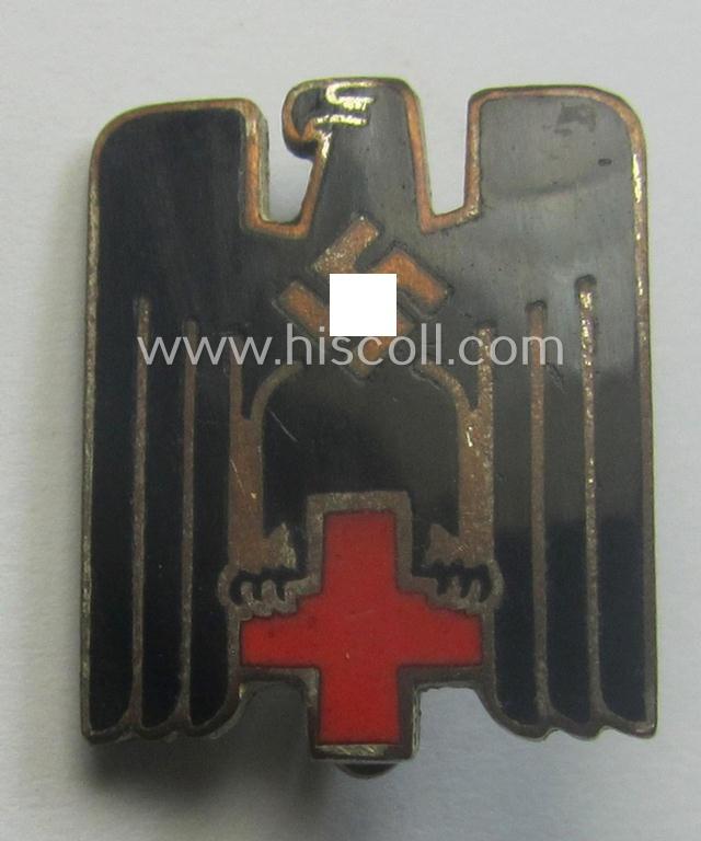 Multi-coloured and/or neatly enamelled DRK (ie. 'Deutsches Rotes Kreuz') civil-attire badge (ie. 'Zivilabzeichen des D.R.K.') being a maker- (ie. 'E.L.M.'-) marked example that bears a: 'Ges.Gesch.'-patent-pending designation on its back