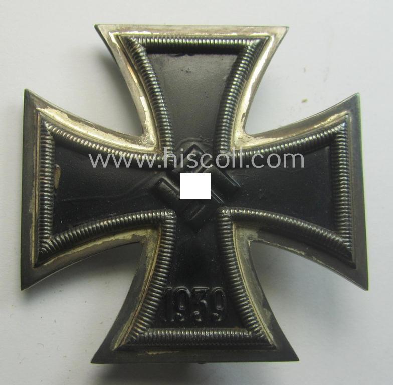 Scarcely found, 'Eisernes Kreuz 1. Klasse' (ie. Iron Cross 1st Class) being a maker- (ie. '107'-) marked example as was produced by the company: 'Carl Wild - Hamburg'