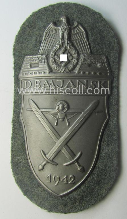 Superb, WH (Heeres ie. Waffen-SS) 'Demjansk'-campaign-shield as executed in typical magnetic, so-called: 'Eisenblech' (and being of the 'missing-log' variant-pattern)