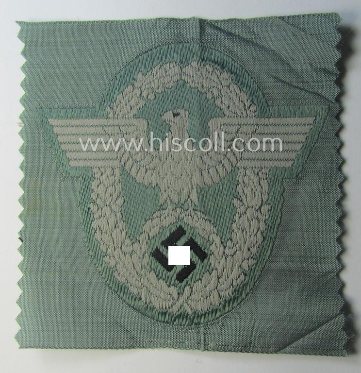Police- (ie. 'Polizei'-) related armbadge (ie. arm-eagle) being a typical 'BeVo'-woven example