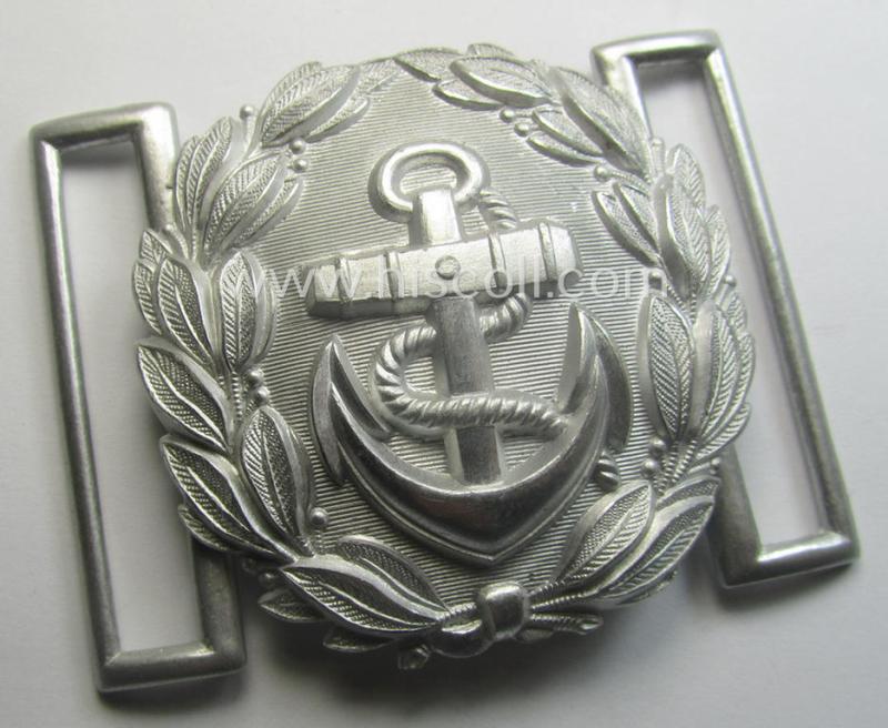 'Virtually mint', WH (Kriegsmarine) 'standard-issue'-pattern, silver-toned- and/or typical aluminium-based officers'-dress-model belt-buckle (ie. 'Paradefeldbinde für Beambten der KM') being a neatly maker- (ie. 'F.L.L.'-) marked example